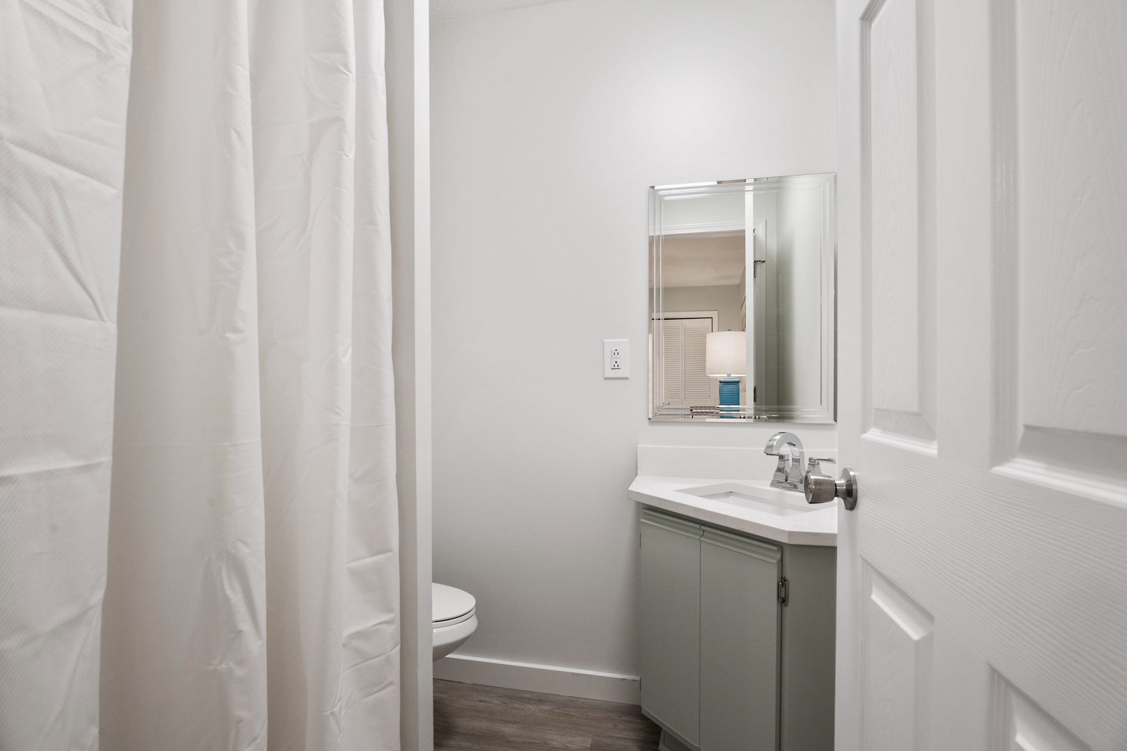 A single vanity & shower await in the king ensuite