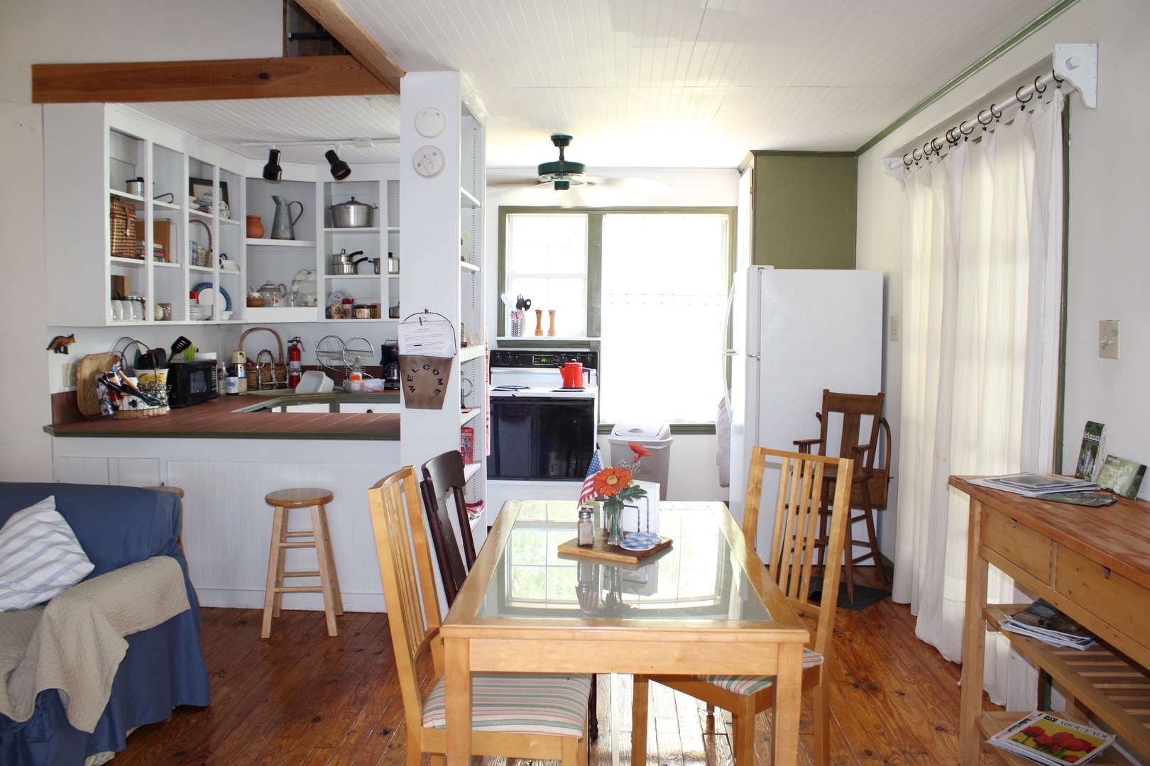 Gather for meals or for a game at the dining table, with room for 4