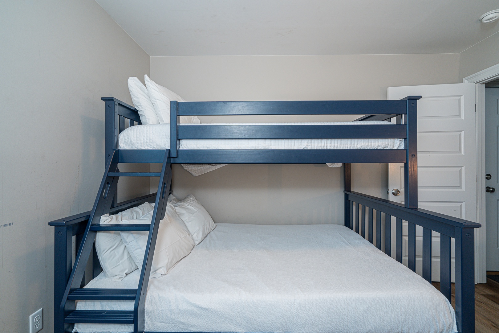 This 2nd floor bedroom offers a twin-over-full bunkbed & twin trundle