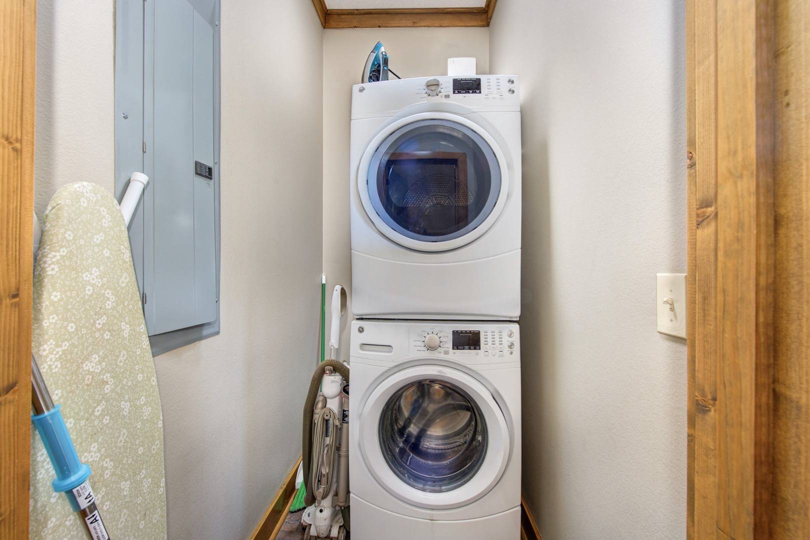 Private laundry is conveniently tucked away in a dedicated closet