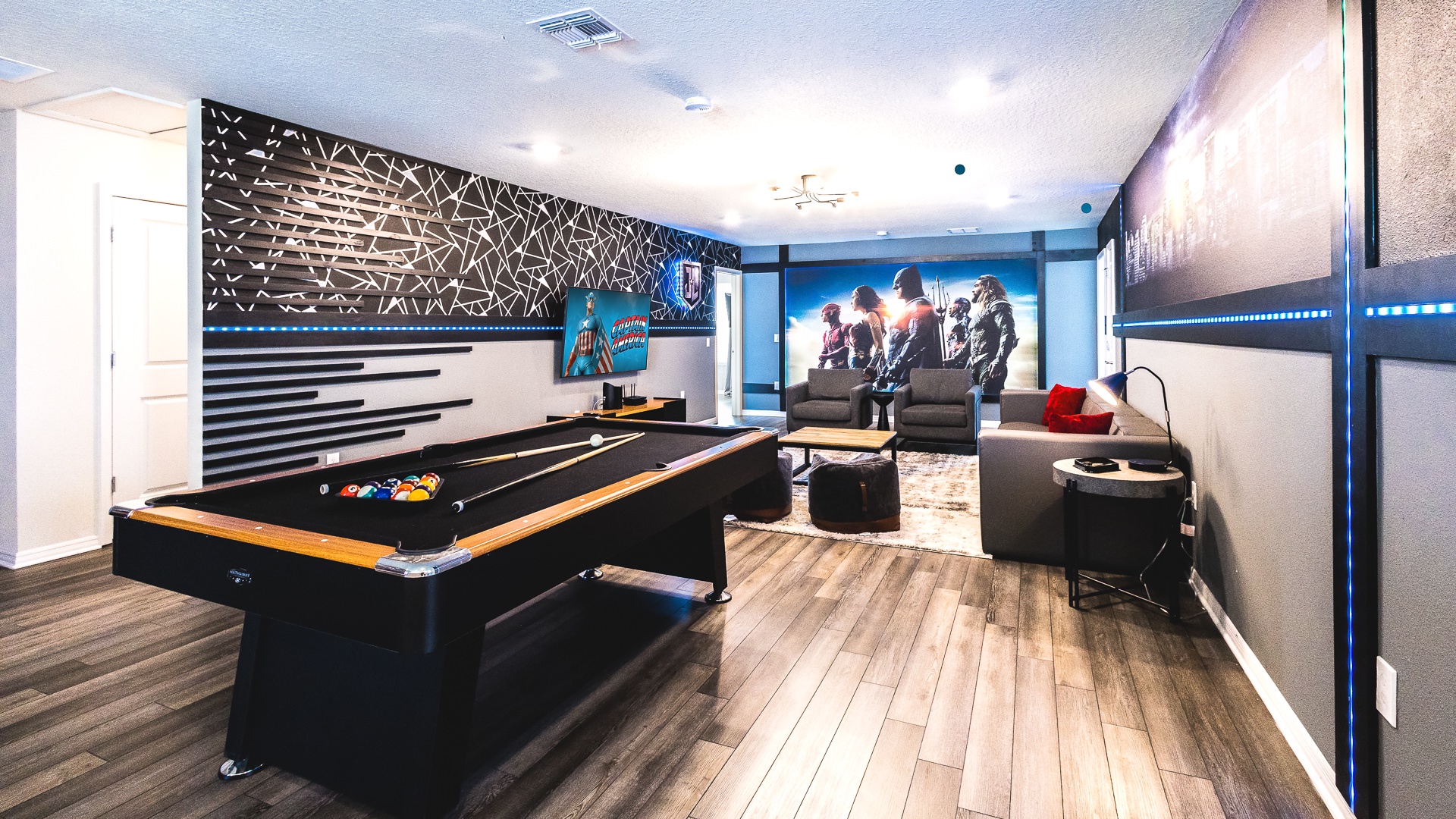 Watch your favorite movie or play some pool in the super hero themed game room