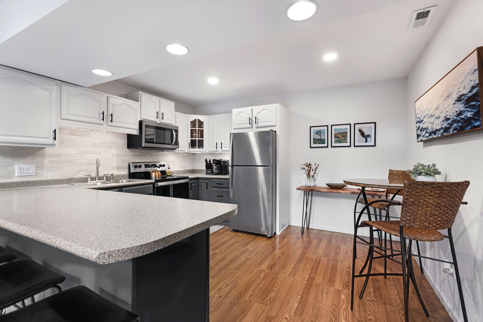 The open, airy kitchen offers ample space & all the comforts of home