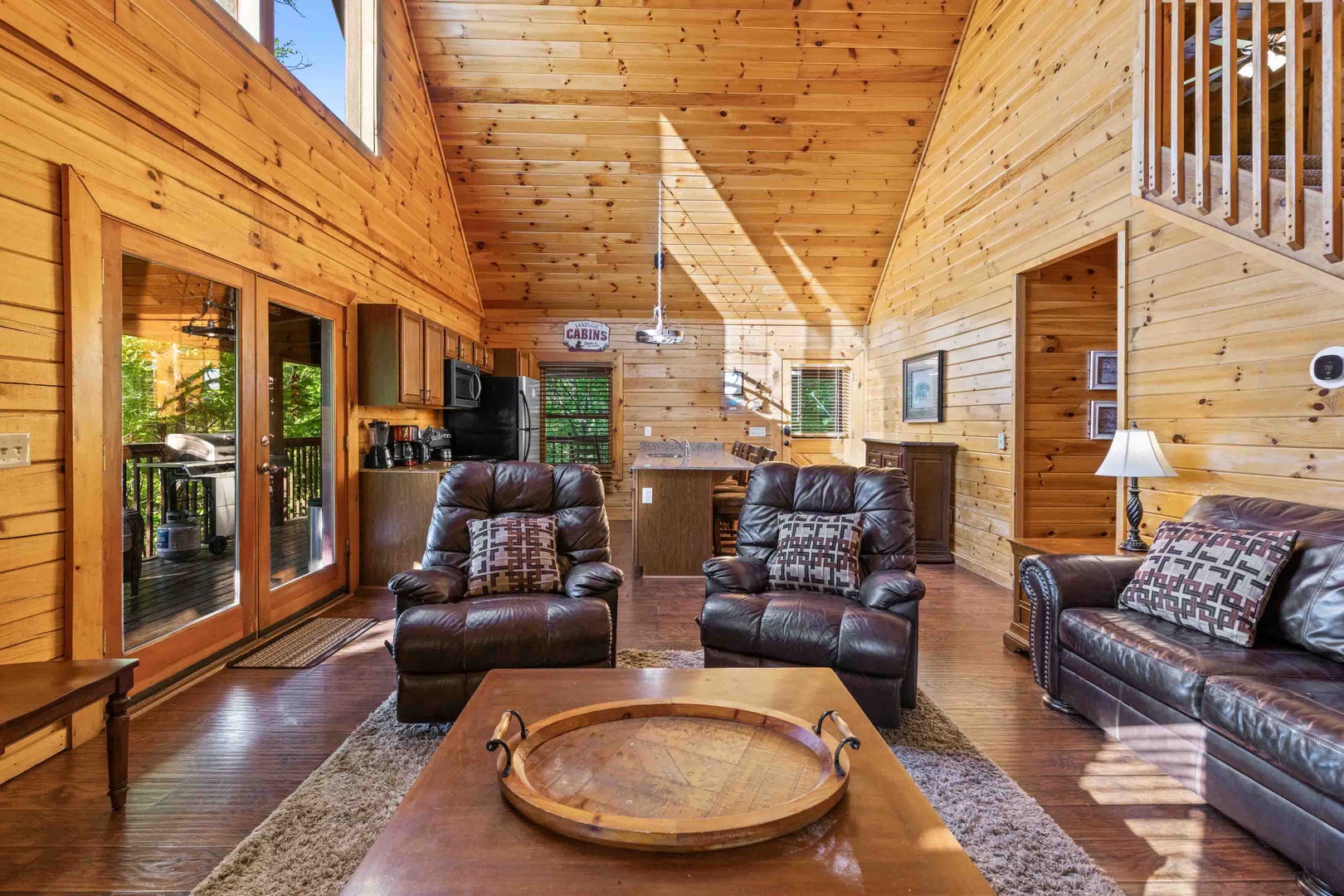 Living area with ample seating, Smart TV, and fireplace