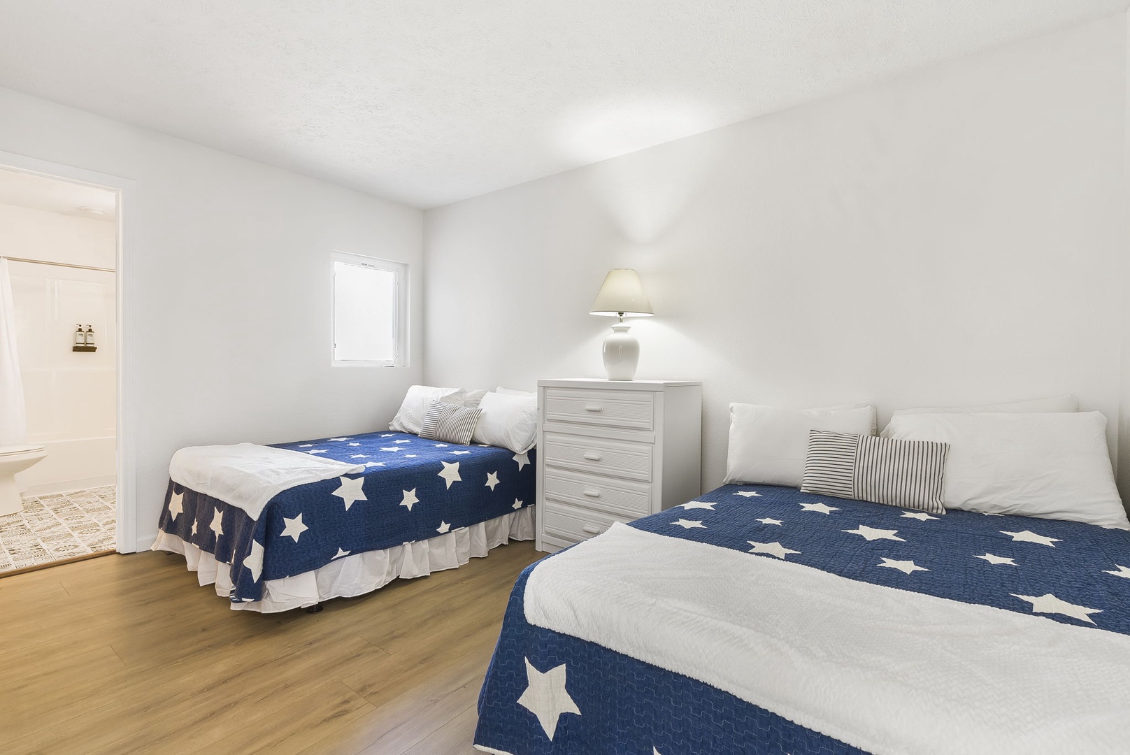 Unit 43: This 2nd floor suite offers a pair of full-sized beds & private en suite