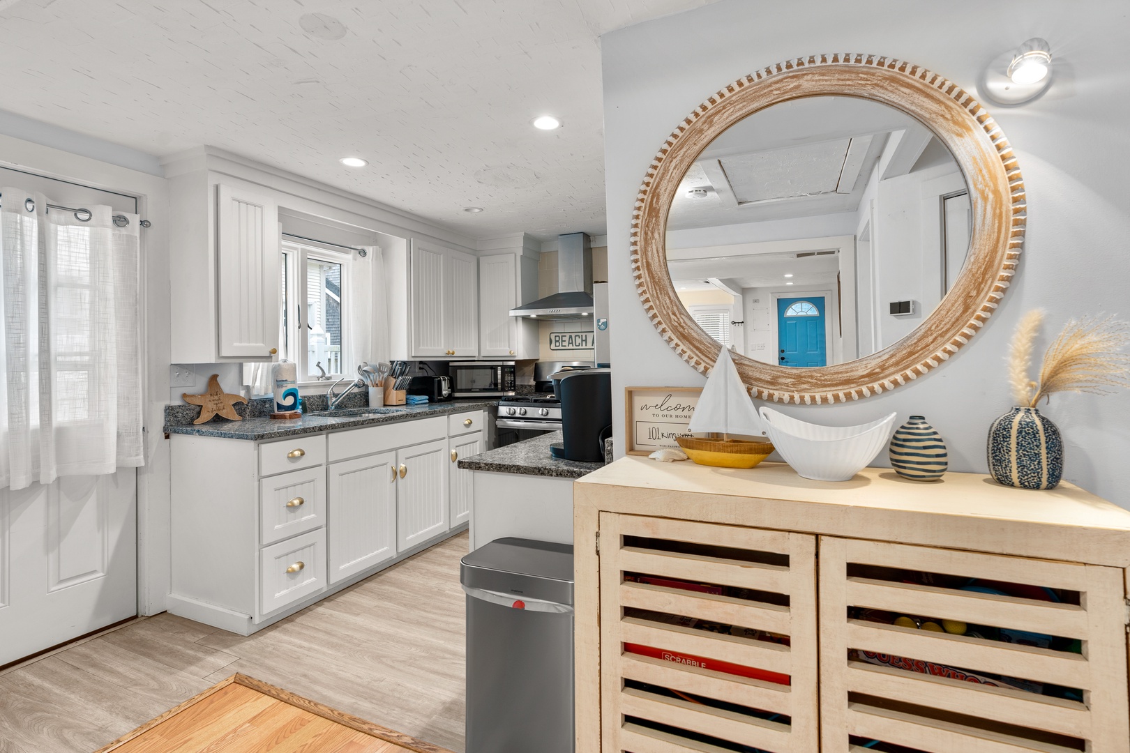The breezy kitchen offers ample space & all the comforts of home