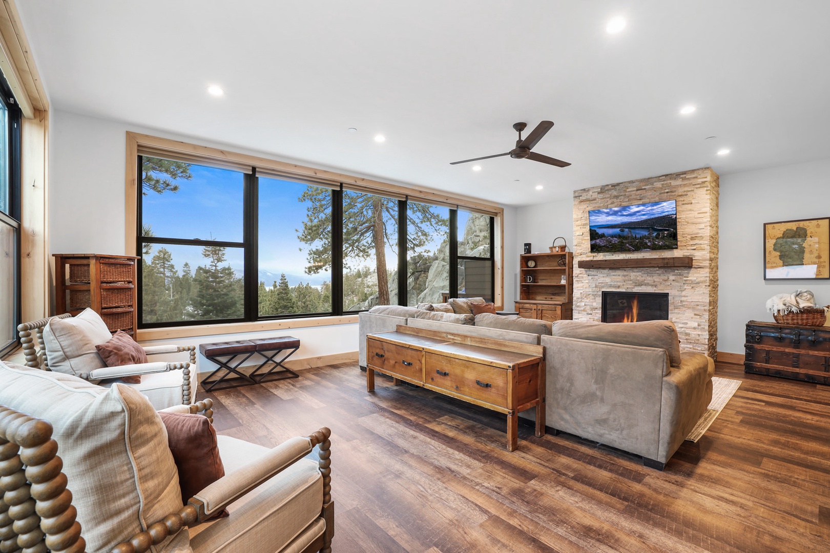 Bright open living space with Smart TV, ample seating and amazing mountain view