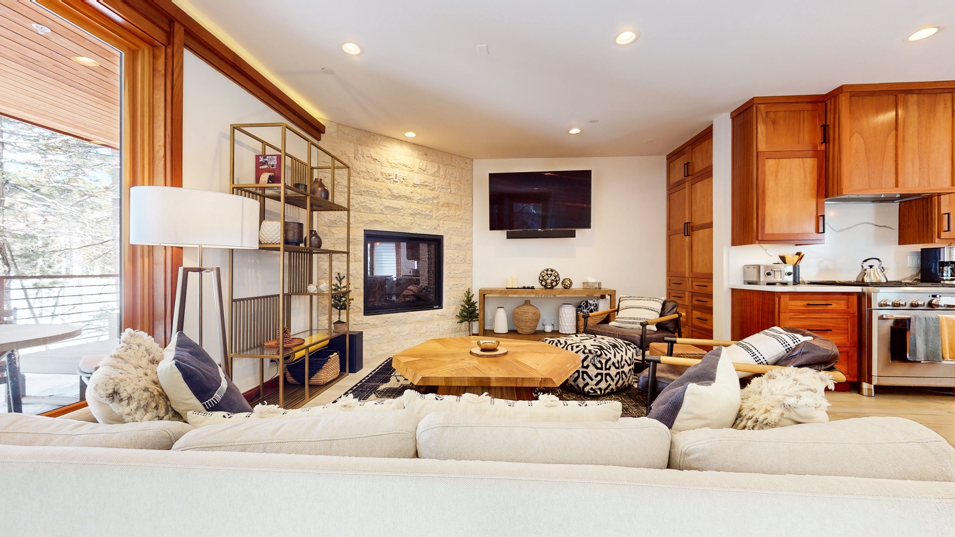 Bright living space with gas fireplace, and Smart TV