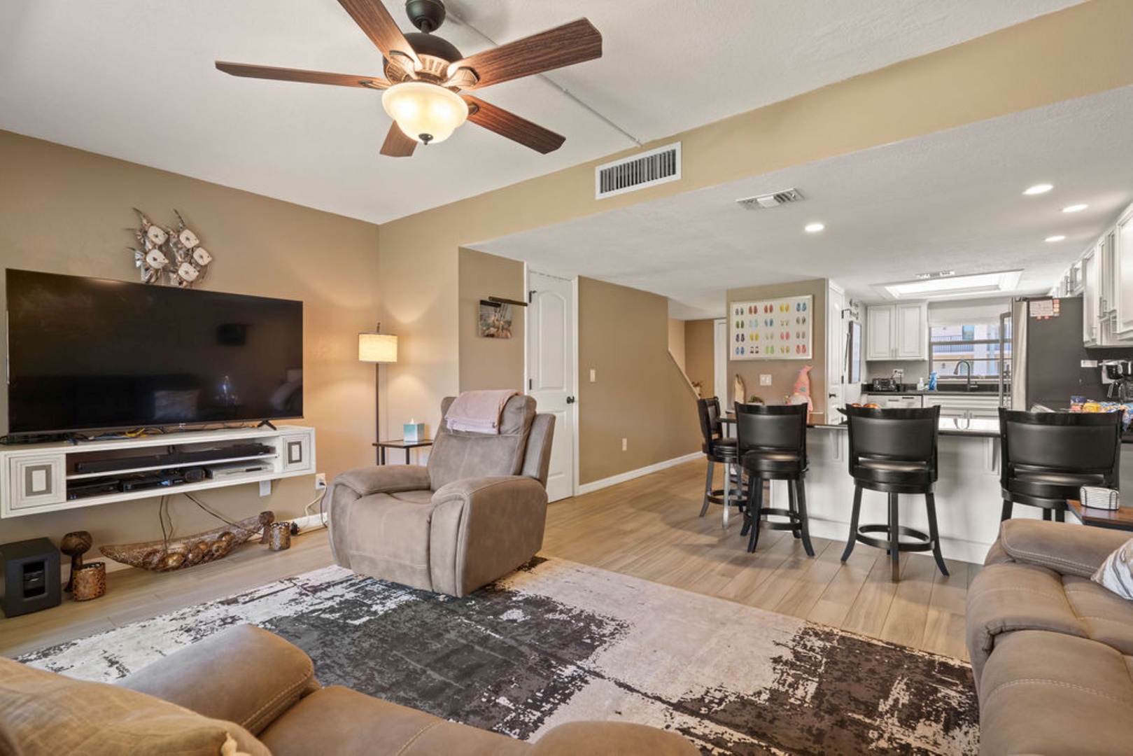 Bright living space with abundant seating, and Smart TV