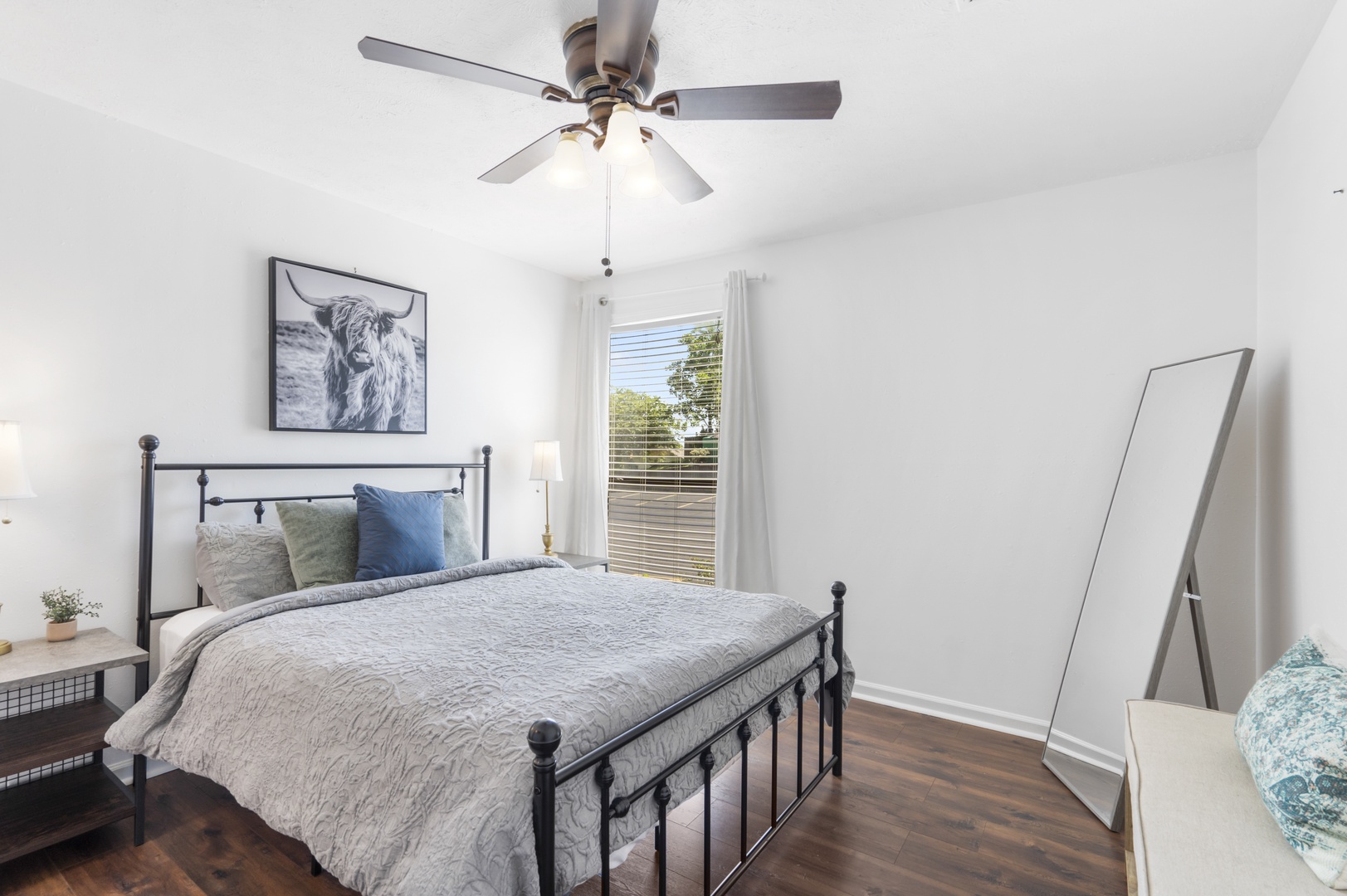 Bedroom with queen bed, Smart TV, and ensuite