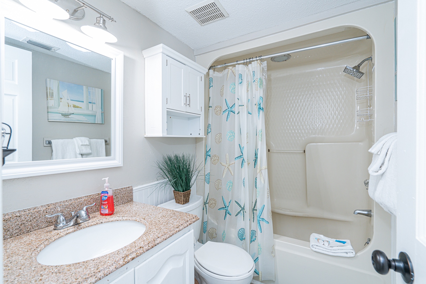 Enjoy a single vanity & shower/tub combo in the upper-level loft ensuite