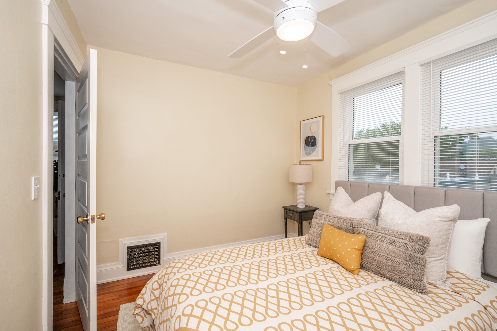 The 3rd of 3 bedrooms offers a full bed & ceiling fan