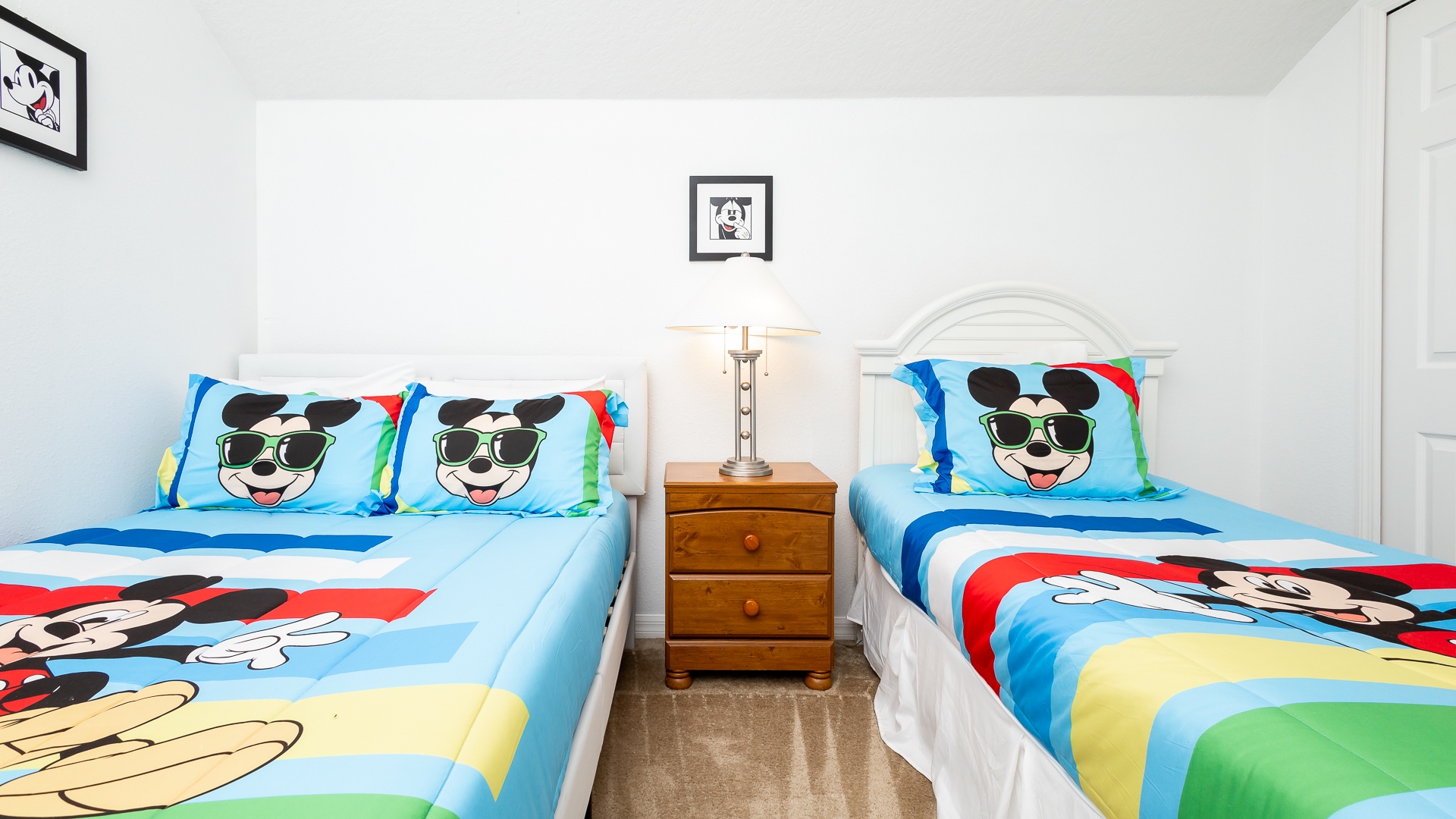 Bedroom 4 Mickey Mouse themed with full bed, twin bed, and Smart TV