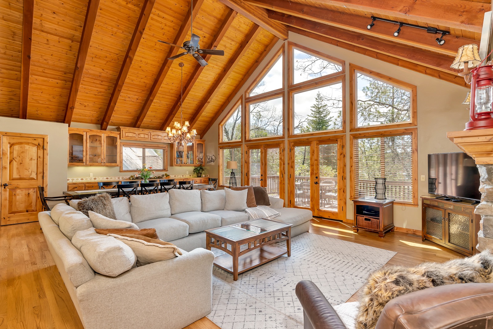 Enjoy the soaring ceilings & breezy, open layout of the main great room