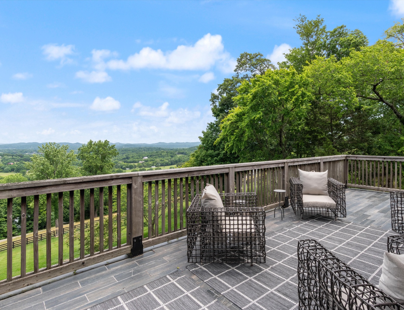 Balcony with outdoor seating and grill