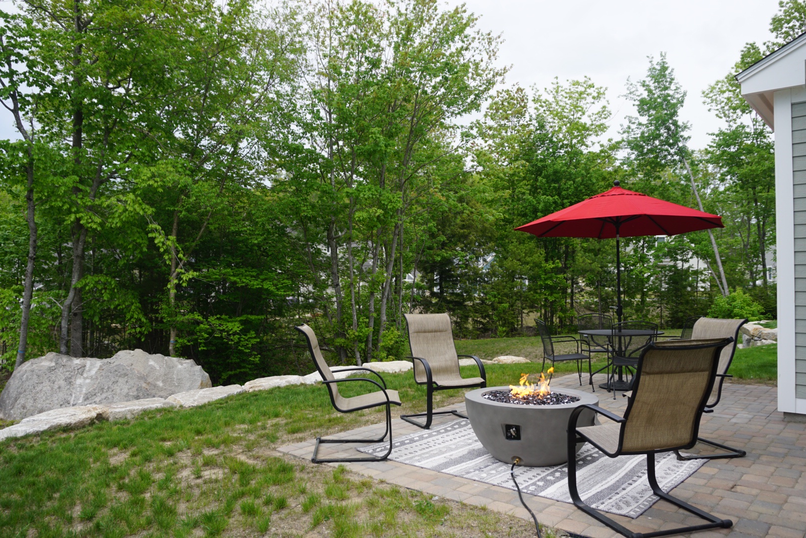 Lounge the day away by the private firepit or dine alfresco on the patio