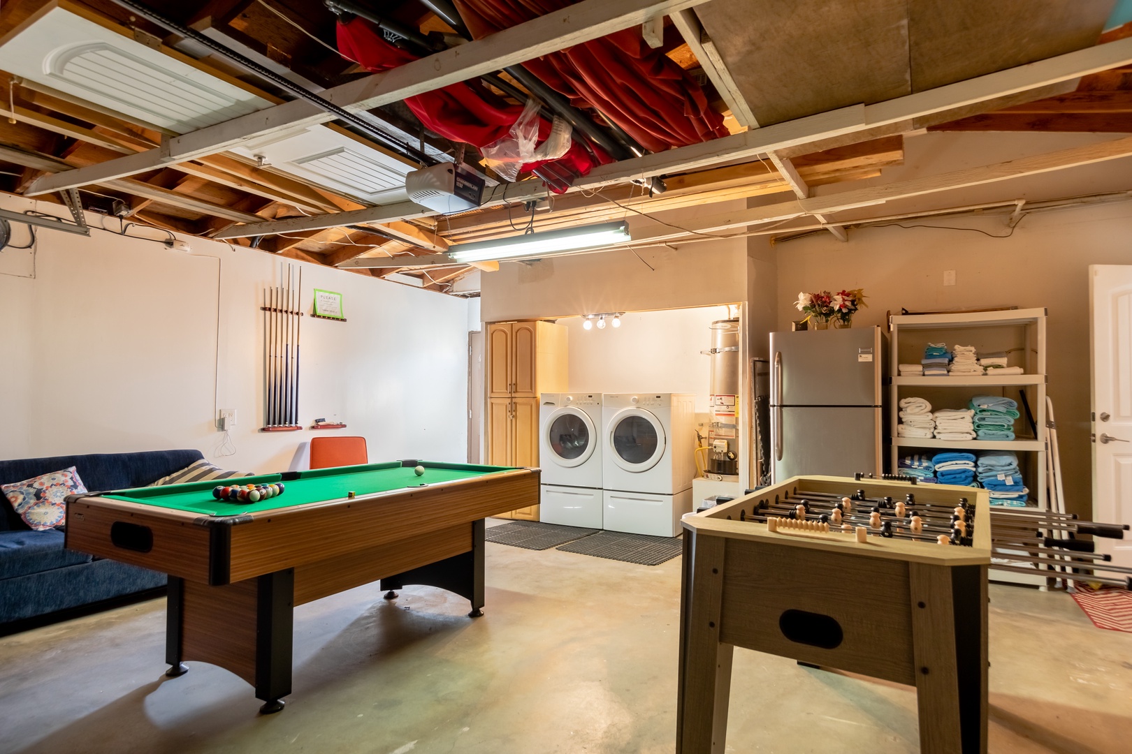 Game room and laundry area with washer/dryer