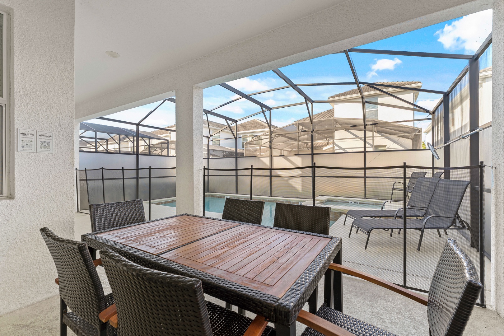 Screened in pool with outdoor seating