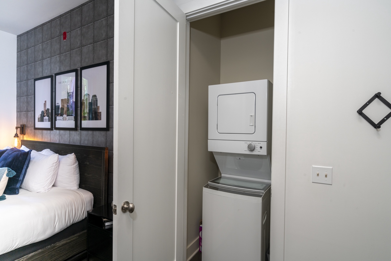 Private laundry is available for your stay, tucked away by the bedroom