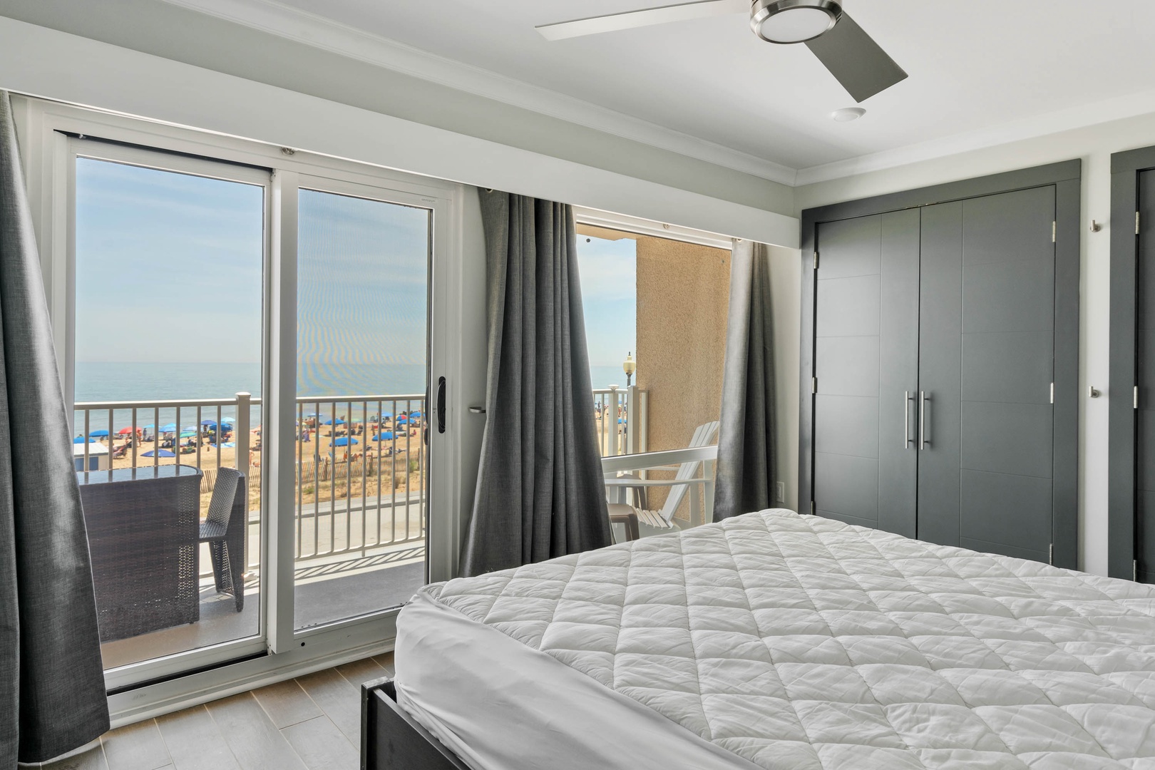 Bedroom 1 with Queen bed, TV,and balcony