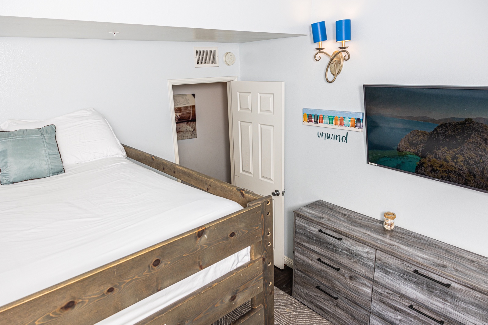 Recharge in the final bedroom, offering a full-sized bunk beds