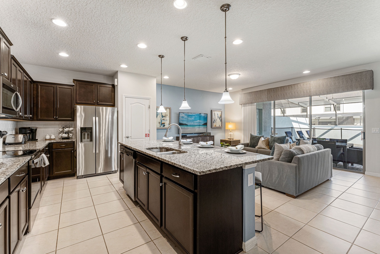 The updated kitchen offers loads of space & all the comforts of home