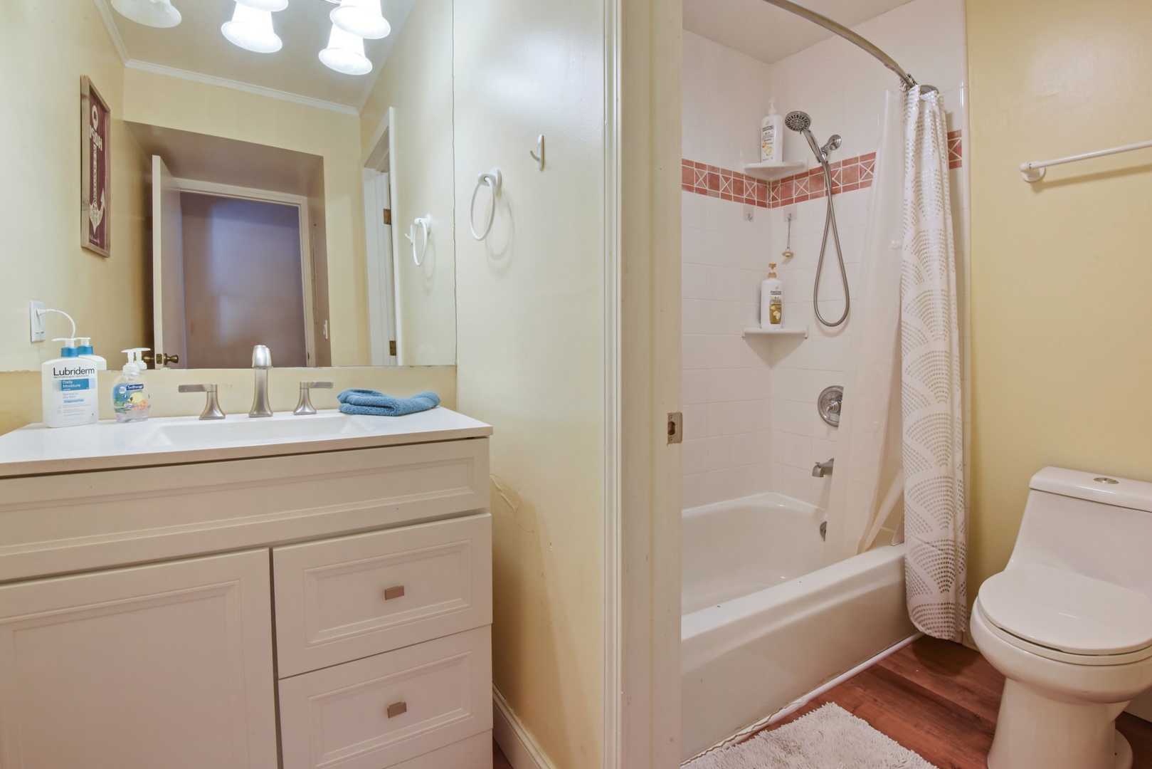 Bathroom 1 provides you a shower/tub combo