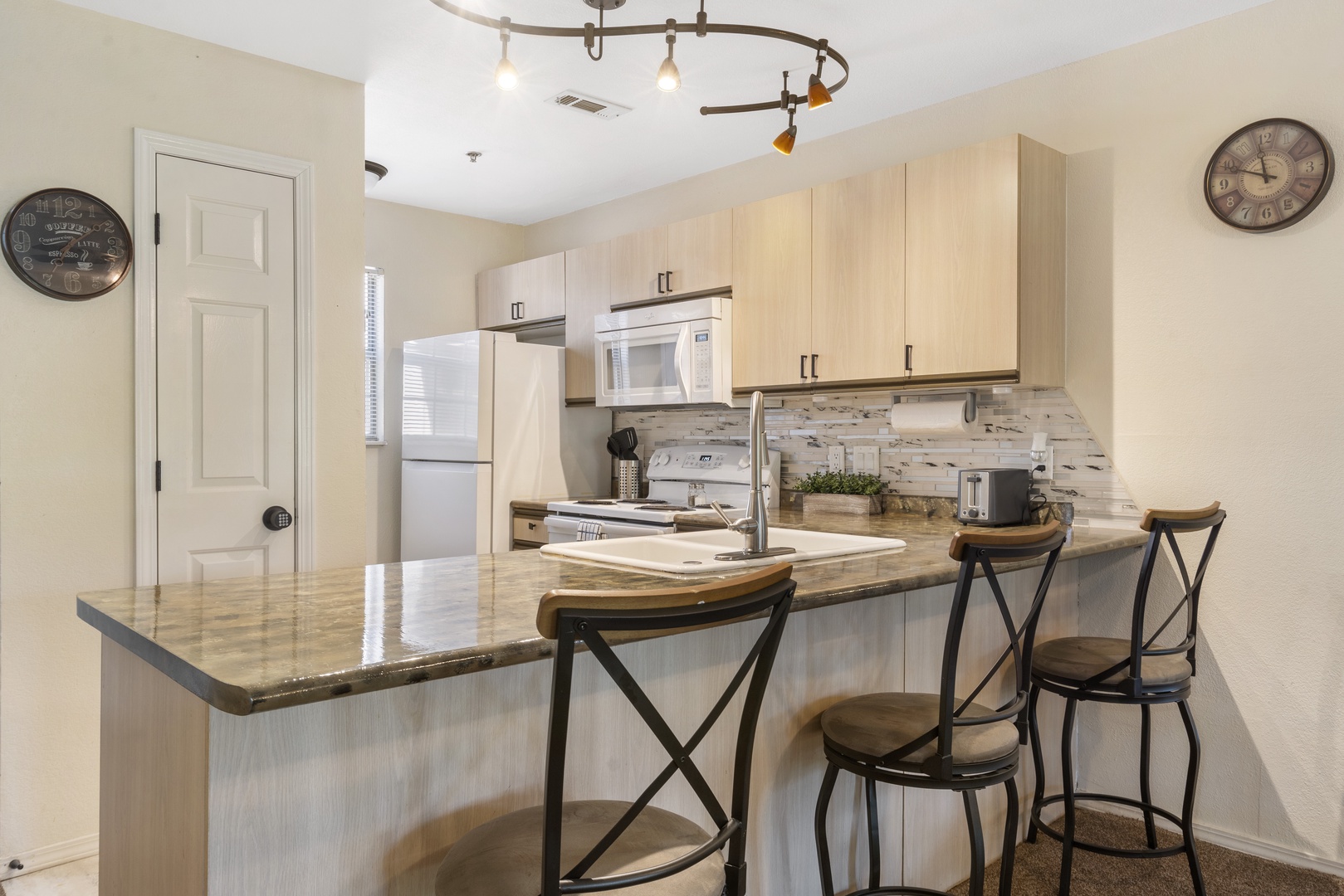 Bar stool seats along the counter