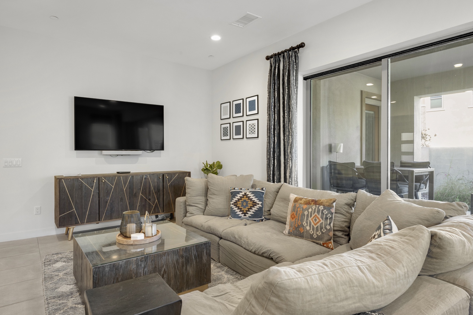 Spacious living space with ample seating, and Smart TV