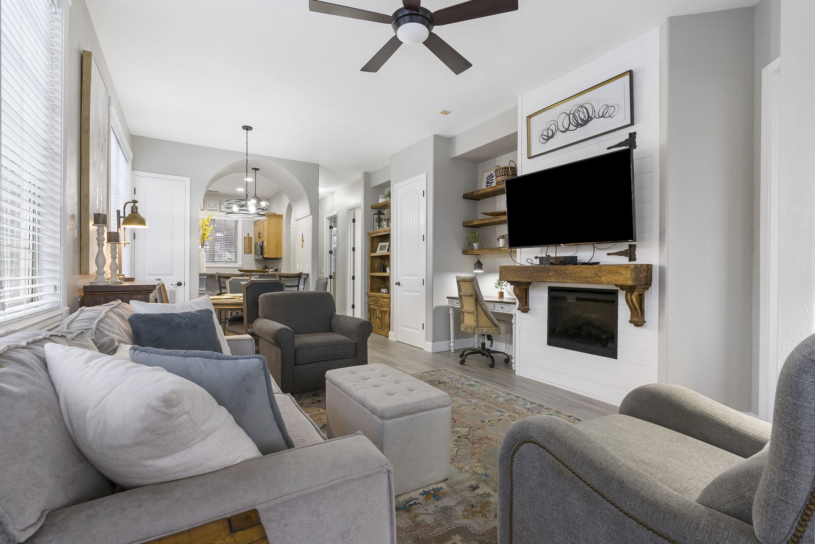 Cozy and spacious living area with TV