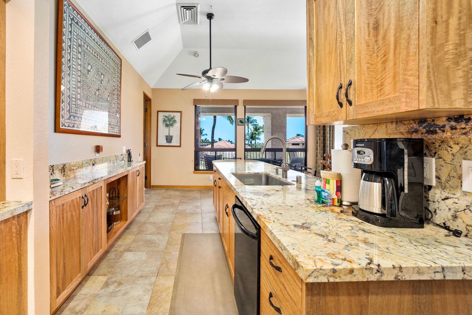 Kitchen with toaster, drip coffee maker, dishwasher and more