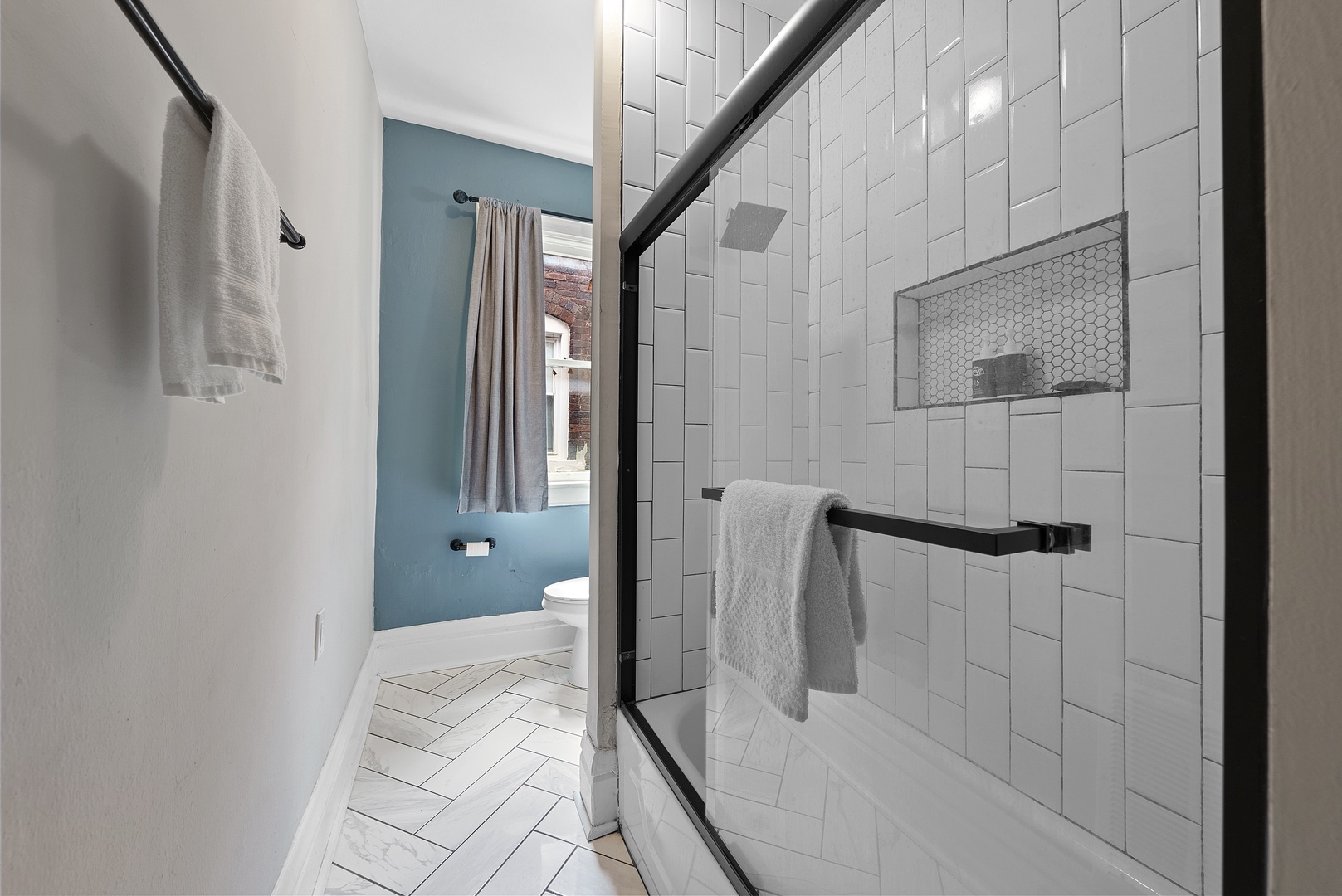 Wash up in Apartment 1166’s full bath, with a single vanity & shower/tub combo