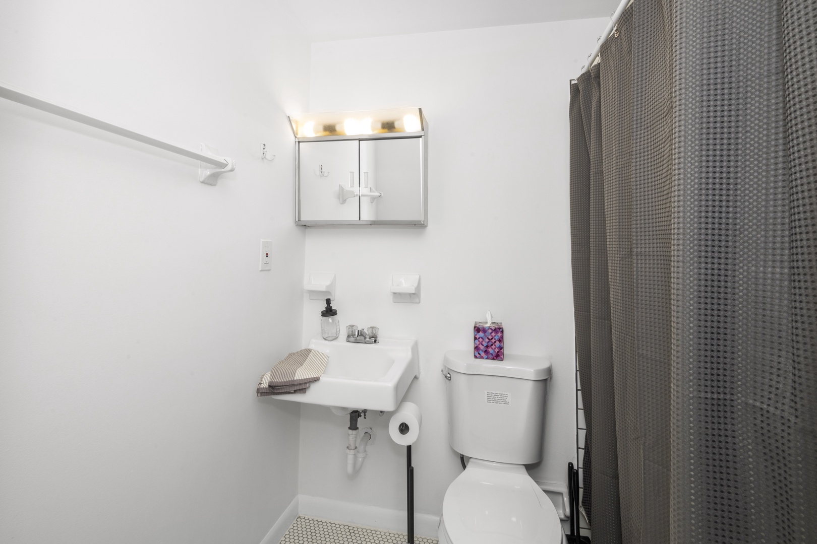 Suite 1: The elegant full bath offers a shower/tub combo