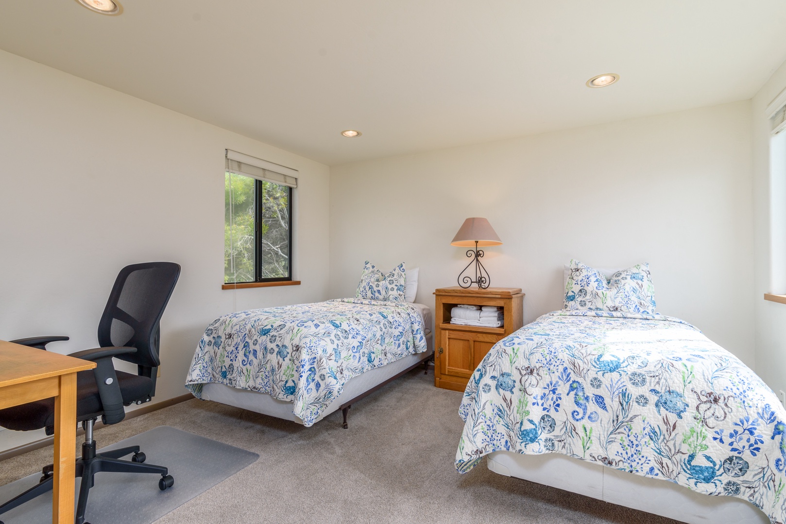 Loft with 2 twin beds, and desk