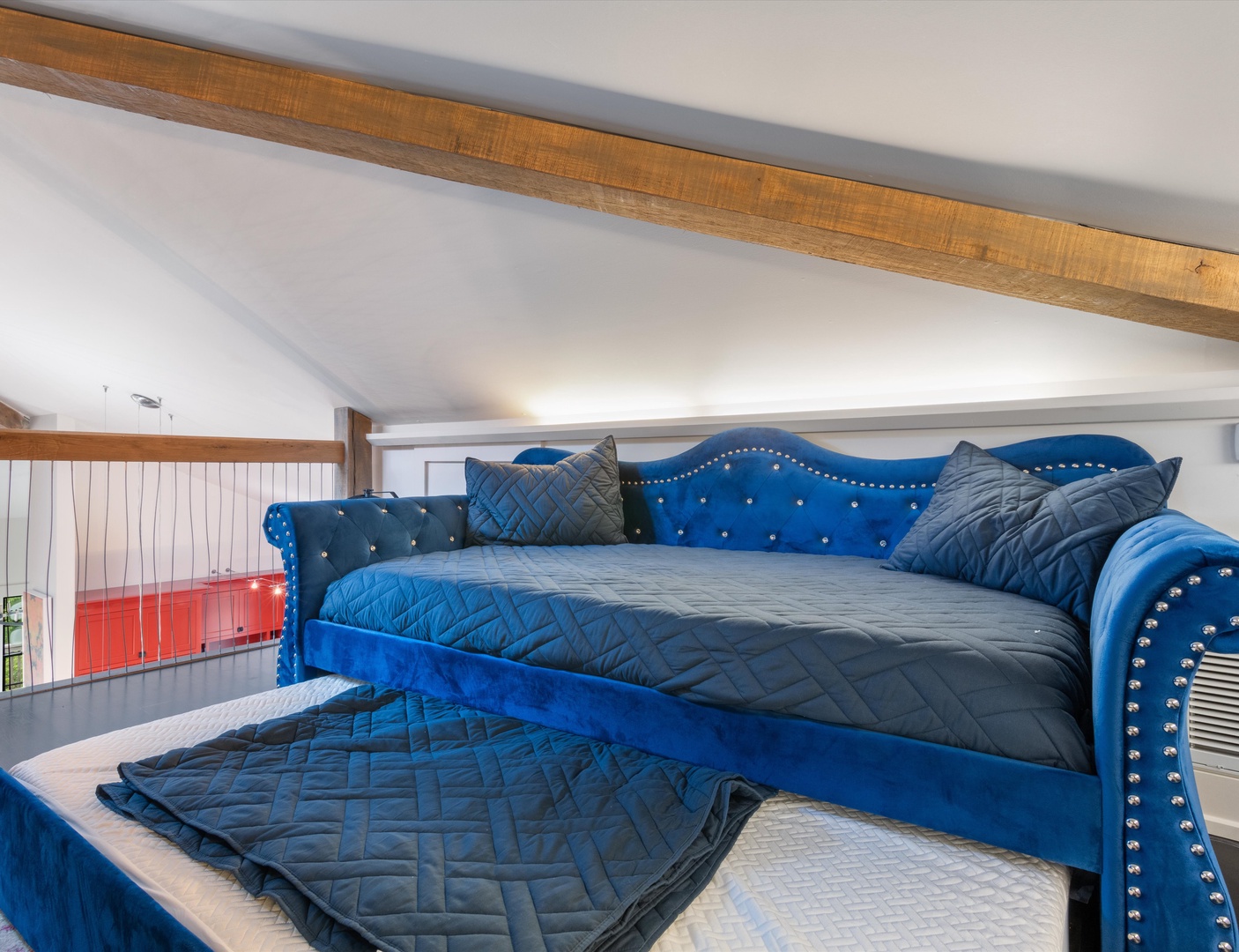 Loft with king bed, 2 twin beds, and 2 trundles