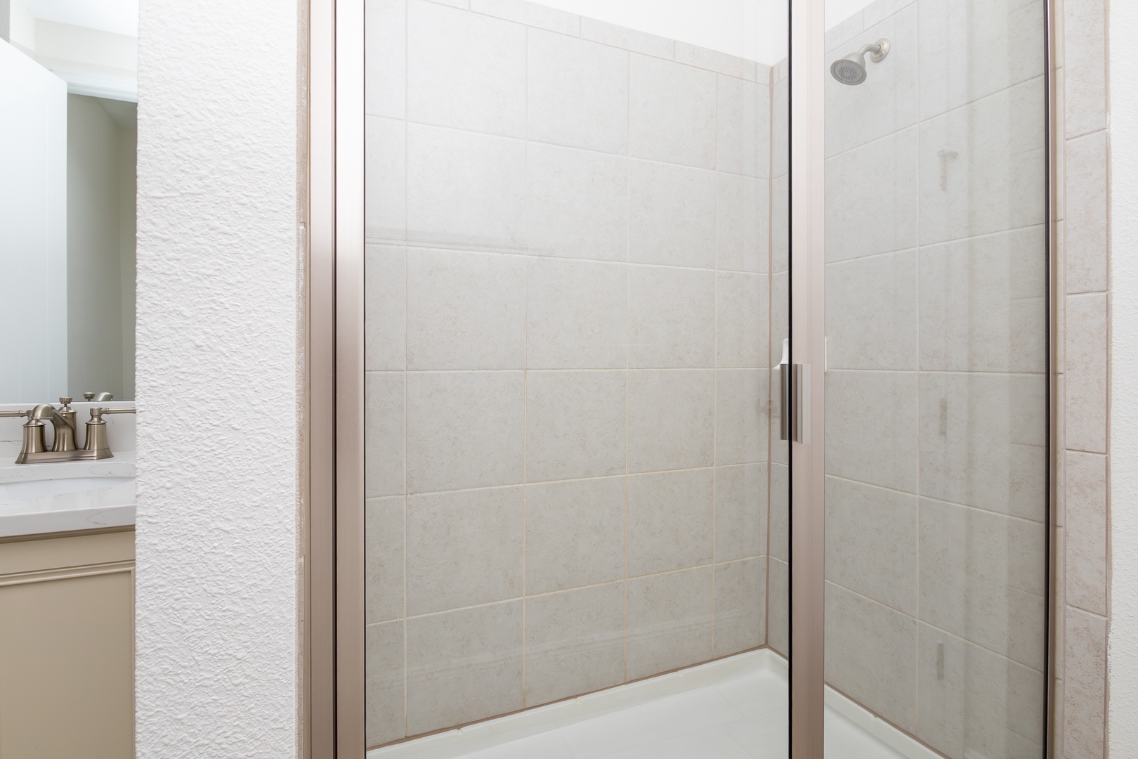A double vanity & walk-in shower with separate oversize tub ensuite bath