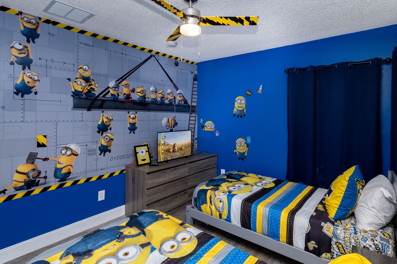 The Minions in your group will love this room’s plush twin beds & smart TV