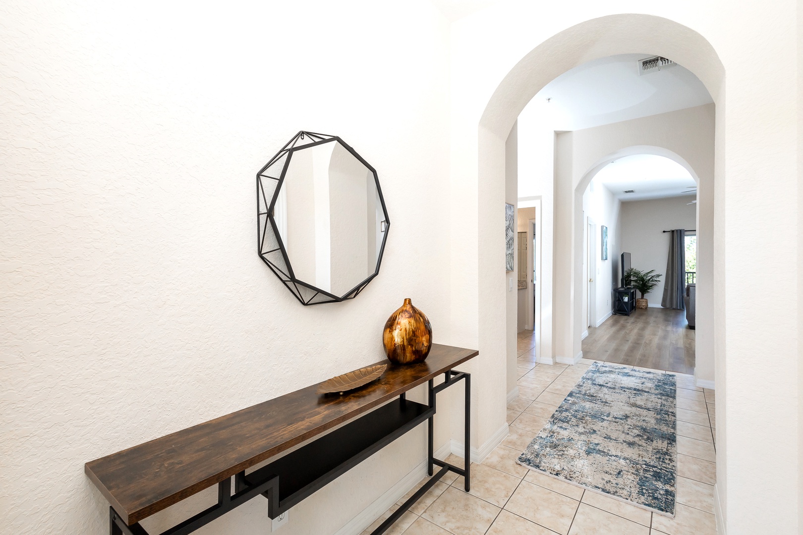 A bright, spacious entryway will welcome you home