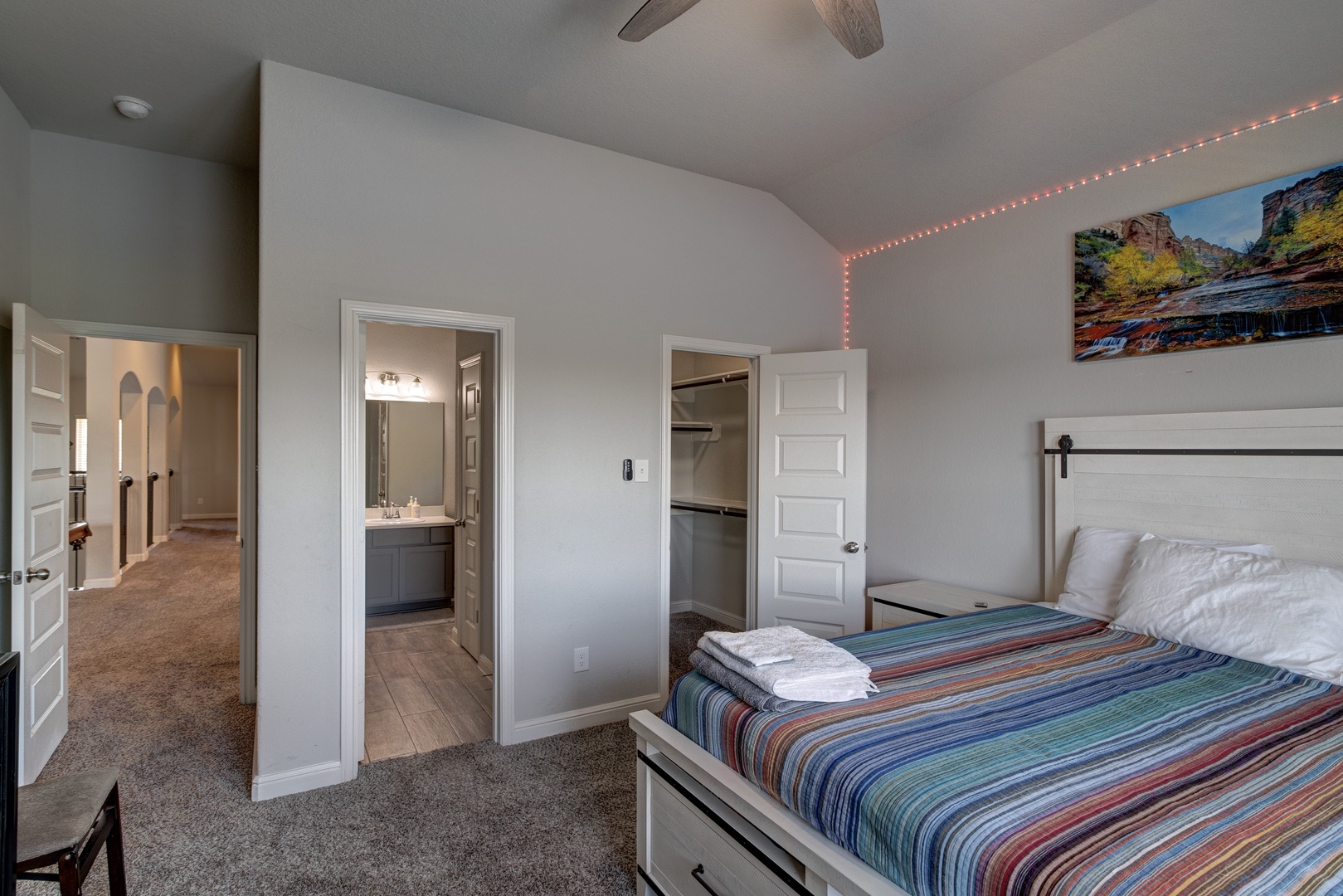 Bedroom 2 with queen bed, Lake view, Smart TV, and ensuite