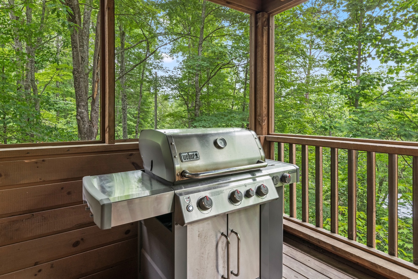 Deck off of the dining room grill, outdoor seating and hot tub