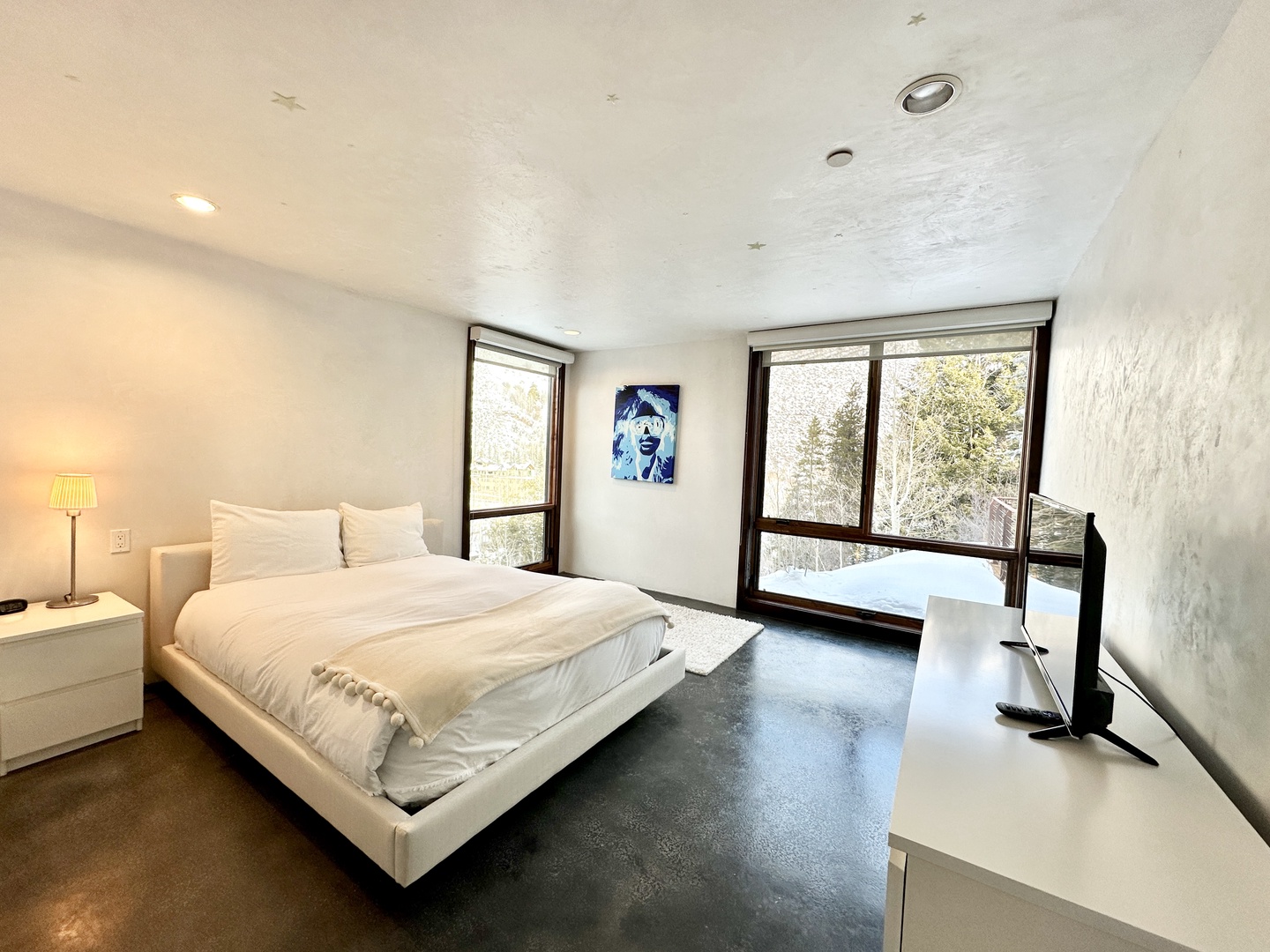 This 2nd-floor suite offers a queen bed, private ensuite, & Smart TV