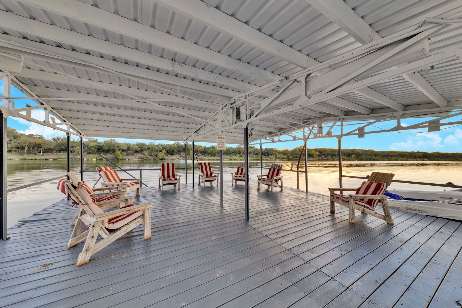 Covered Floating Waterfront Deck with a Jet Ski Ramp