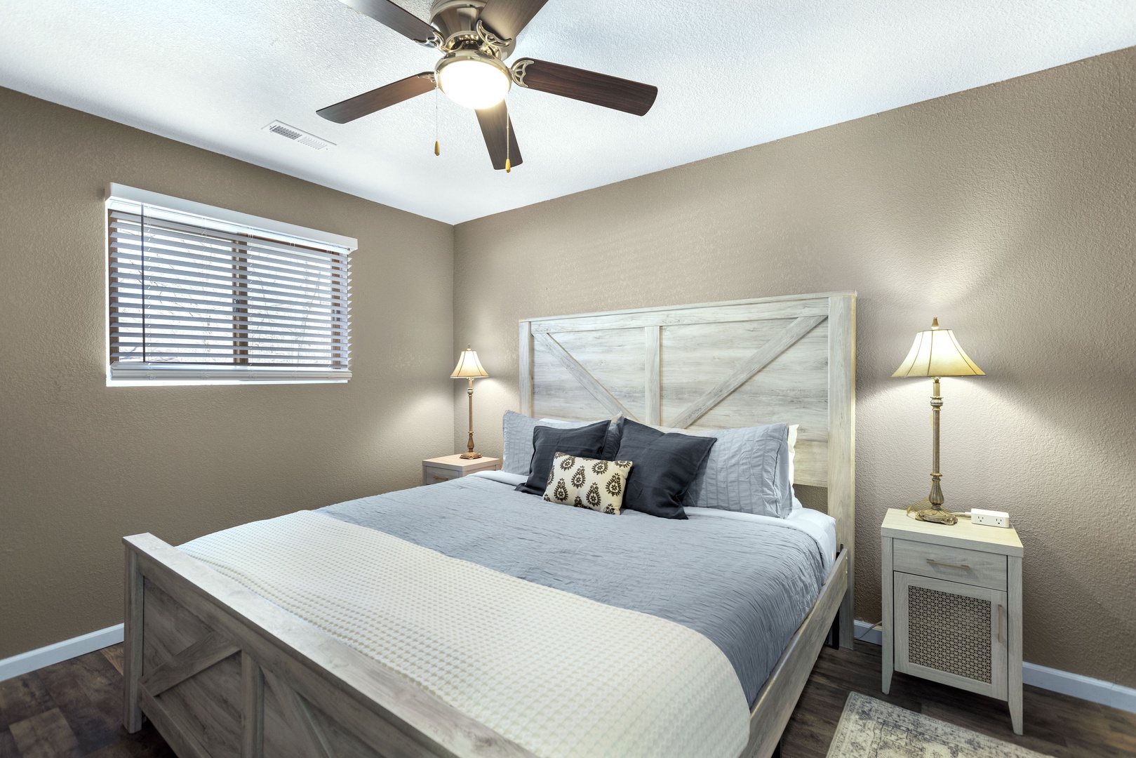 The second king bedroom offers a ceiling fan & lots of closet space