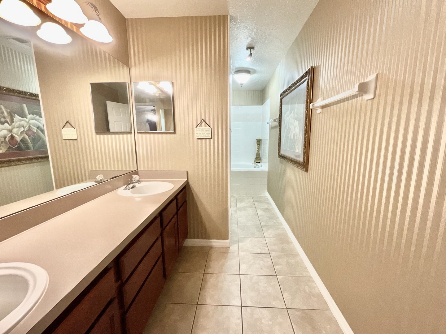 A double vanity & shower in this ensuite with separate soaker tub