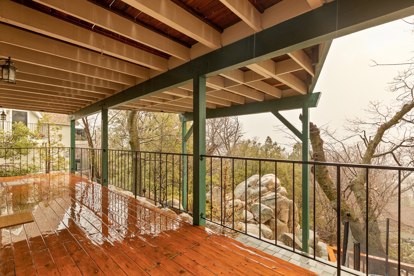 Covered deck off the Family Room offering views of stunning natural scenery