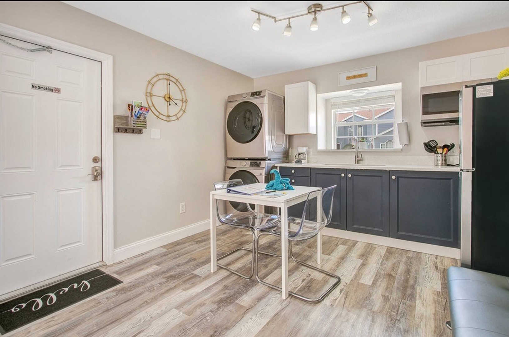 Cozy studio kitchenette with seating for two—perfect for any meal