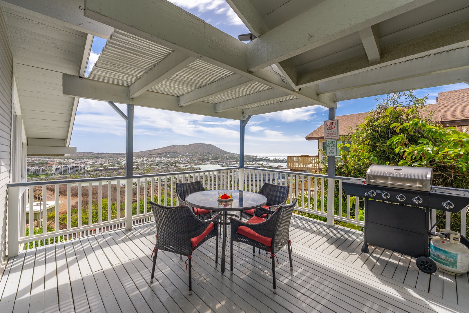Upper balcony with outdoor seating and grill and more views