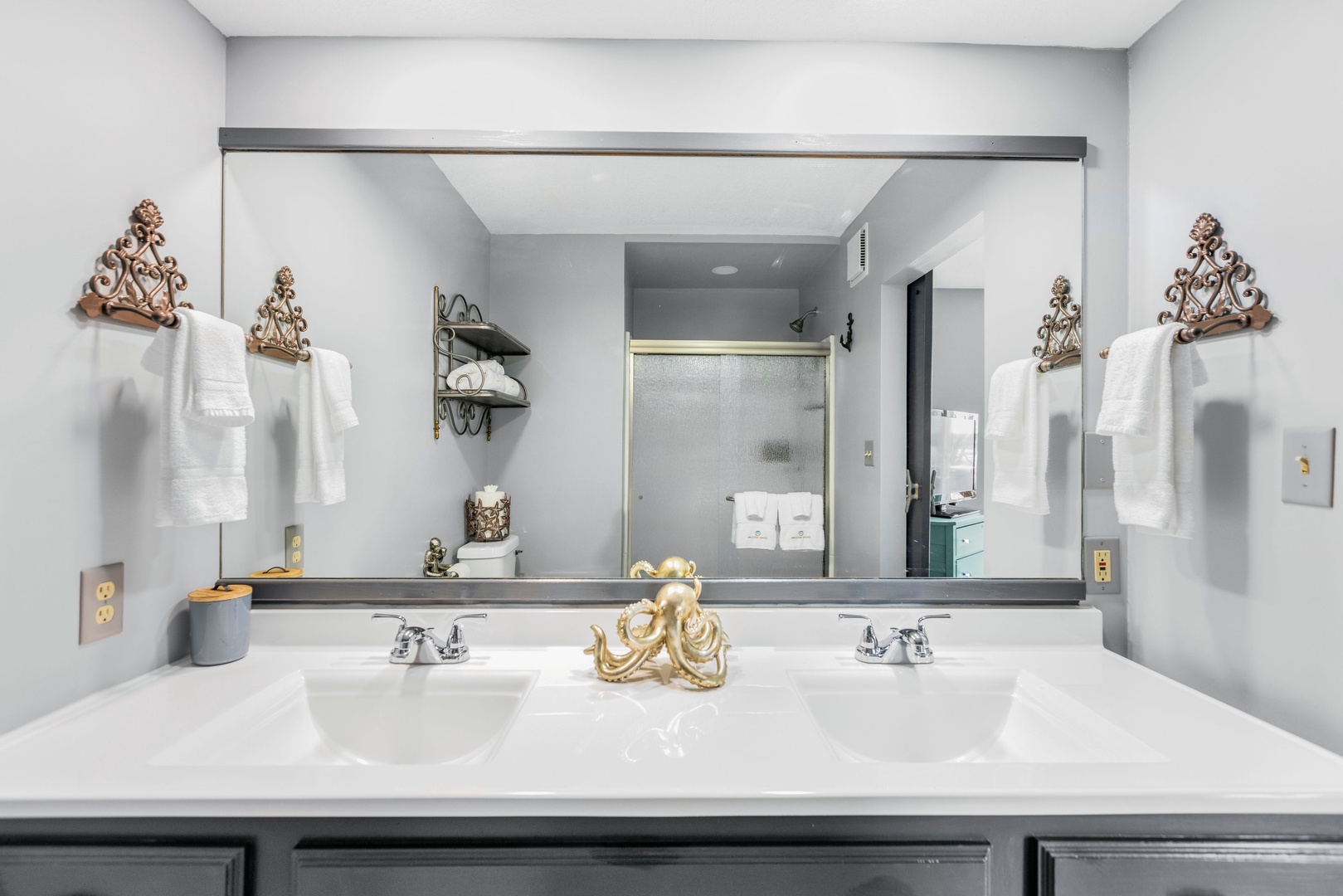 En-suite bathroom with double vanity and shower
