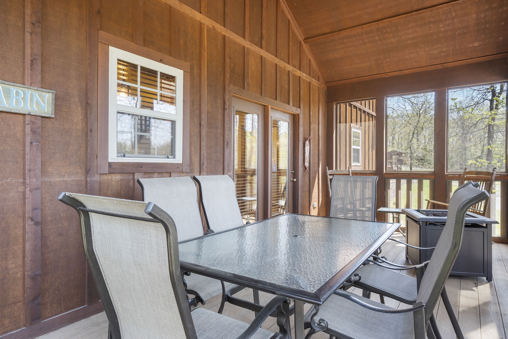 Screened deck with out door furniture & fire pit