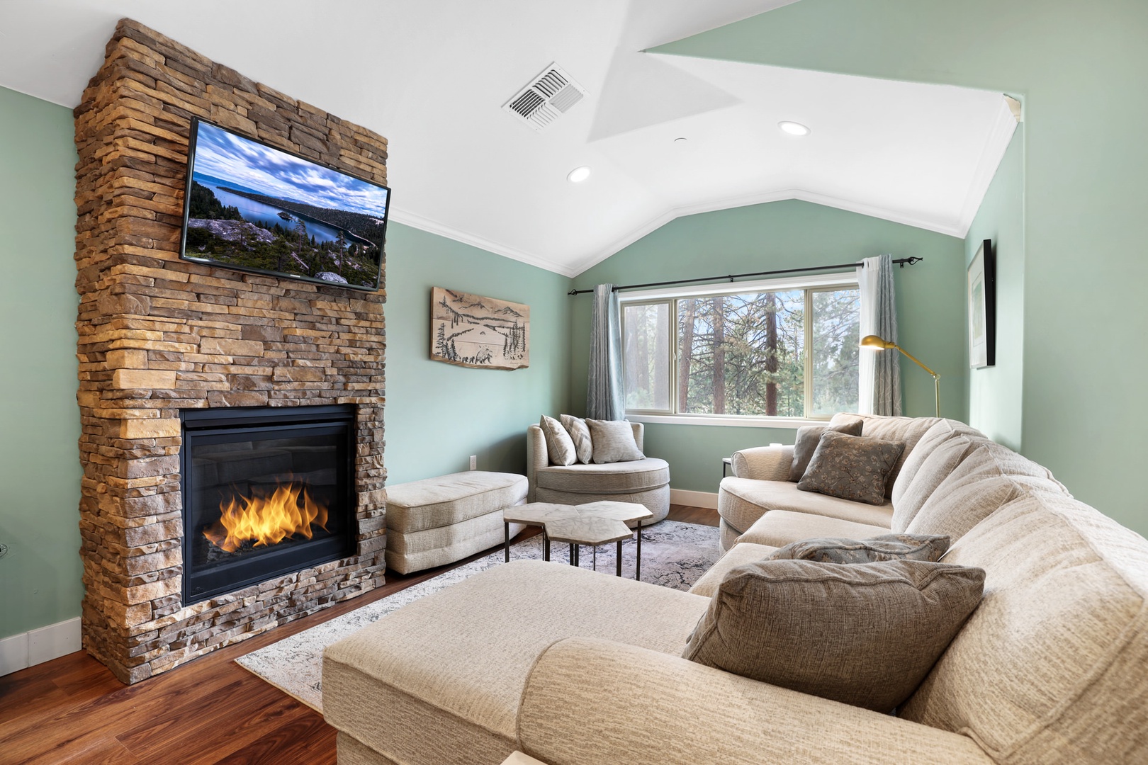 Living room with smart TV and gas fireplace