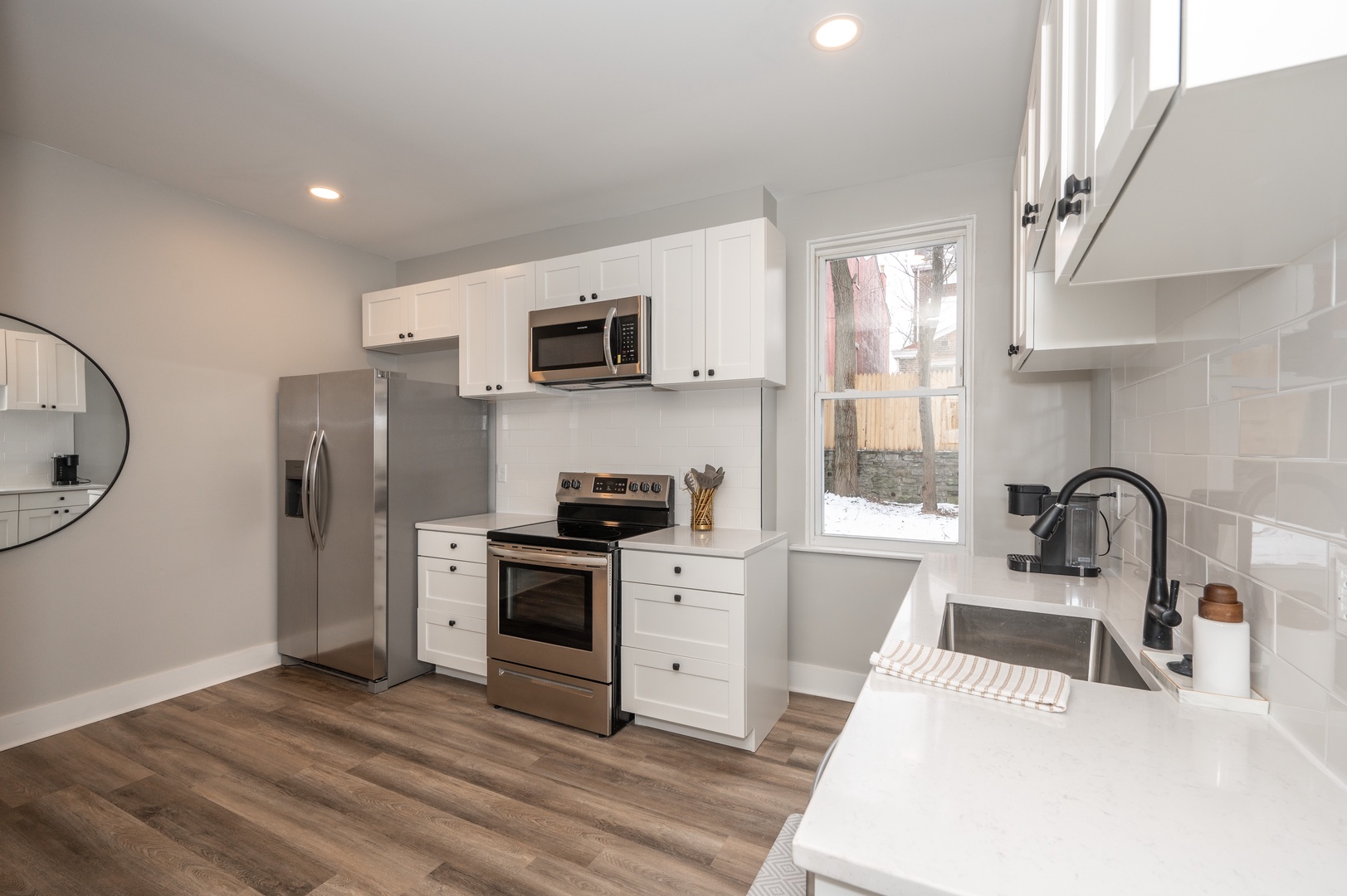 Apt 1 – The kitchen is spacious & well equipped for your visit to Covington